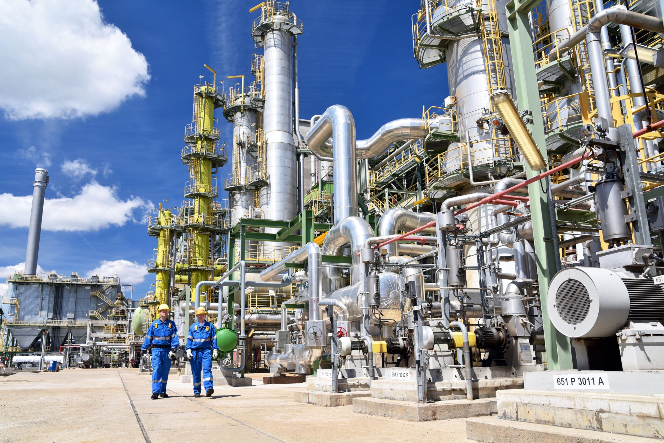Chemical,Industry,Plant,-,Workers,In,Work,Clothes,In,A Chemical,Industry,Plant,-,Workers,In,Work,Clothes,In,A