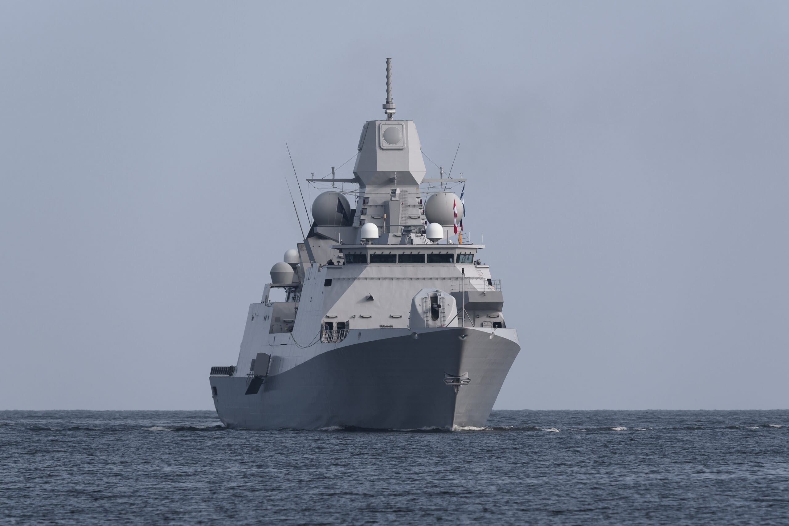 Warship,-,A,Modern,Frigate,Sails,On,The,Sea Warship,-,A,Modern,Frigate,Sails,On,The,Sea