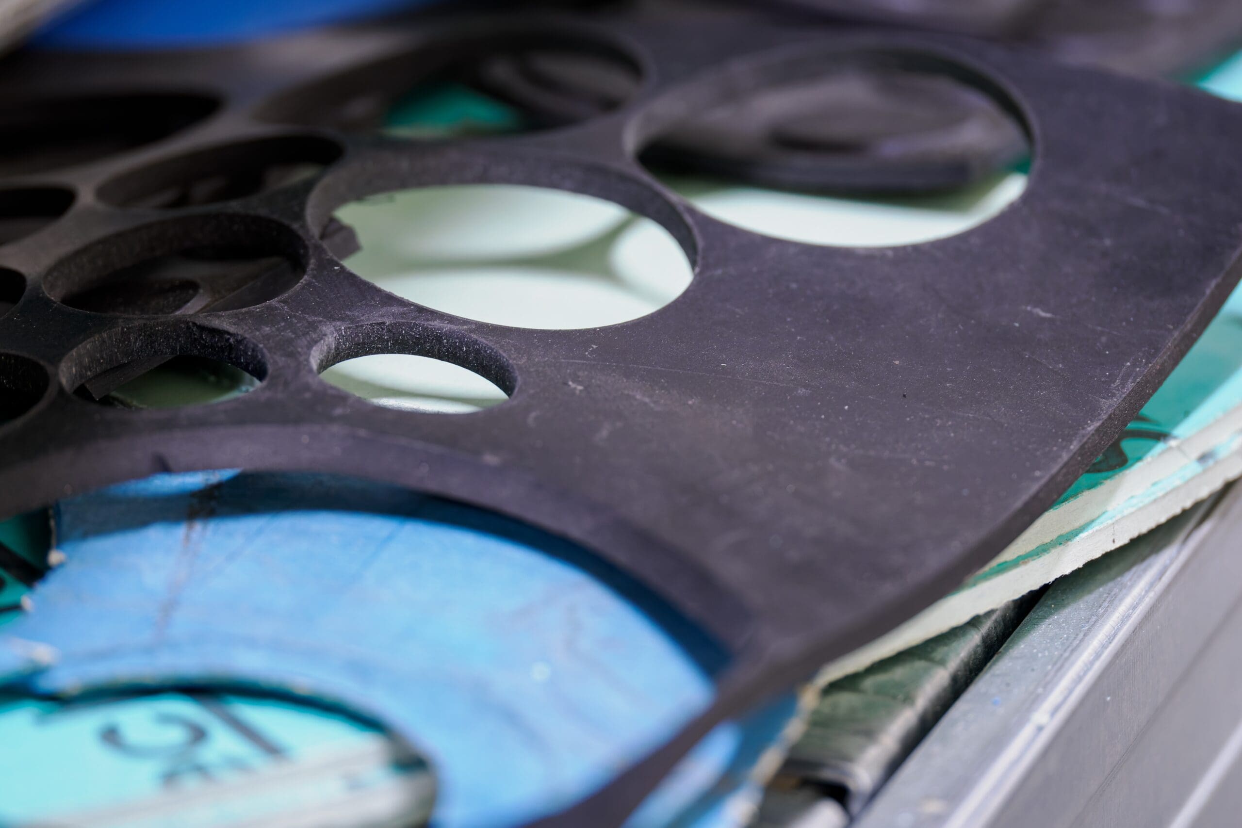 Die-cut,Wheels,On,A,Rubber,Mat. Die-cut,Wheels,On,A,Rubber,Mat.