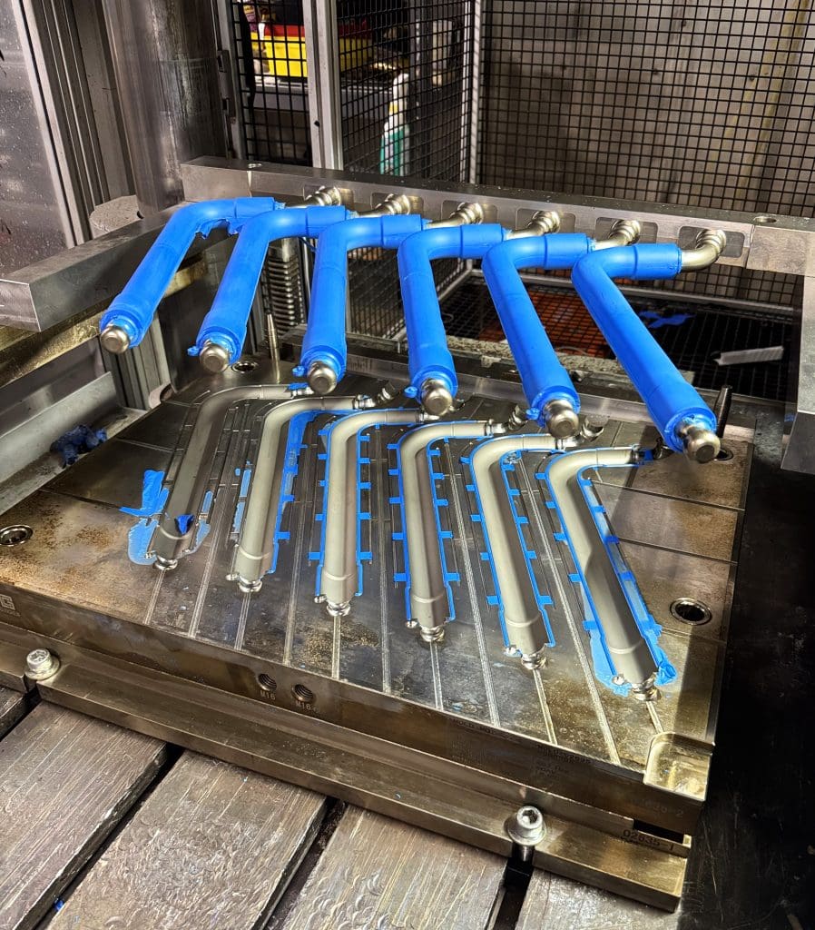 Injection Molding – Blue Tubes | The Rubber Group